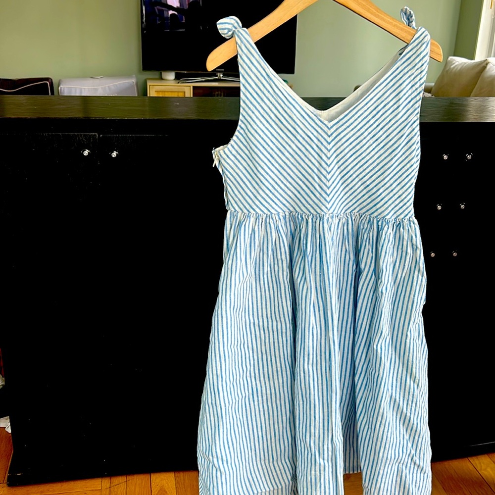 2 cotton dresses. One pink strips and one blue.